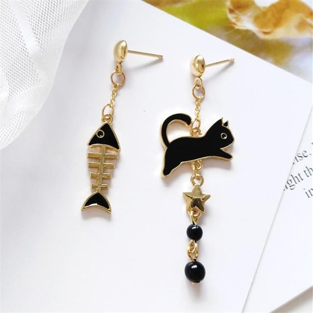 clous d'oreilles noirs